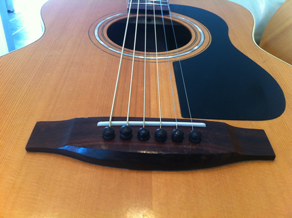 Compensating Guitar Bridge Saddle